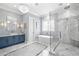 Elegant bathroom featuring marble floors, soaking tub, and walk-in shower at 419 S Shore Crest Dr, Tampa, FL 33609