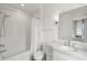 Elegant bathroom with white subway tile shower and modern vanity with marble countertop at 419 S Shore Crest Dr, Tampa, FL 33609