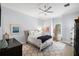 Bedroom with grey walls, light carpet and area rug at 419 S Shore Crest Dr, Tampa, FL 33609