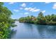 Scenic waterfront view showcasing tranquil canal waters surrounded by mature trees and lush vegetation at 419 S Shore Crest Dr, Tampa, FL 33609