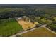 Aerial view of a property with the parcel boundaries outlined in white at 495 Appaloosa Rd, Tarpon Springs, FL 34688