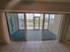 Enclosed balcony with tile flooring offering serene views of the outdoors at 6315 Shoreline Dr # 3107, St Petersburg, FL 33708