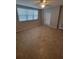 Bright bedroom with tile flooring, ceiling fan and window with blinds at 6315 Shoreline Dr # 3107, St Petersburg, FL 33708