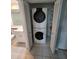 A laundry closet offers the convenience of an in-unit, stacked washer and dryer set at 6315 Shoreline Dr # 3107, St Petersburg, FL 33708