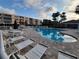 Relaxing poolside featuring ample seating and views of the community at 6315 Shoreline Dr # 3107, St Petersburg, FL 33708