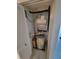A utility closet featuring a hot water tank, and HVAC unit, and storage for household needs at 6315 Shoreline Dr # 3107, St Petersburg, FL 33708