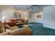 Cozy living room featuring comfortable seating and a bright, airy ambiance at 6421 Wilshire Dr, Tampa, FL 33615