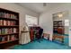 Office with bookshelf and desk perfect for getting work done at home at 6421 Wilshire Dr, Tampa, FL 33615