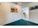 Cozy room featuring neutral walls, with carpet and ample natural light at 6421 Wilshire Dr, Tampa, FL 33615
