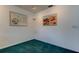Neutral room with artwork, carpet and ample natural light at 6421 Wilshire Dr, Tampa, FL 33615