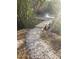 Scenic wooden dock extending over the water, surrounded by trees at 6903 11Th Ave E, Palmetto, FL 34221