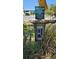 Electric utilities on a post with signs, near a wooded area at 6903 11Th Ave E, Palmetto, FL 34221
