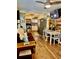 Bright and open living space featuring a dining area, modern kitchen, and cozy seating at 6903 11Th Ave E, Palmetto, FL 34221