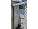 This outdoor shower has lattice walls and metal plumbing at 6903 11Th Ave E, Palmetto, FL 34221