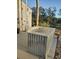 Outdoor soaking tub with metal cladding, set on a stone patio near lush landscaping at 6903 11Th Ave E, Palmetto, FL 34221