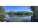 Beautiful waterfront property offering serene water views surrounded by lush greenery at 6903 11Th Ave E, Palmetto, FL 34221