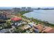 Gorgeous aerial view of waterfront neighborhood with coastal waterway in background at 7075 Sunset S Dr, South Pasadena, FL 33707