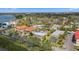 Wide aerial shot of homes, trees and the waterway at 7075 Sunset S Dr, South Pasadena, FL 33707