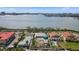 Waterfront home lot outlined in white with skyline in background at 7075 Sunset S Dr, South Pasadena, FL 33707