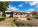 View of the front of the home and walkway at 7075 Sunset S Dr, South Pasadena, FL 33707