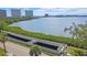 Scenic waterfront area with pedestrian bridges, water access, and lush landscaping at 7075 Sunset S Dr, South Pasadena, FL 33707