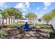 Well-maintained backyard with a gazebo, shed, and seating area, perfect for outdoor entertaining at 708 53Rd N Ave, St Petersburg, FL 33703