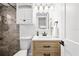 Bathroom featuring wood vanity and an above-counter sink, along with a tiled shower at 708 53Rd N Ave, St Petersburg, FL 33703