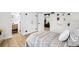 Bright bedroom featuring an en suite bathroom and access to the living room at 708 53Rd N Ave, St Petersburg, FL 33703
