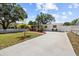 Beautiful home featuring a long driveway and a well-manicured lawn at 708 53Rd N Ave, St Petersburg, FL 33703