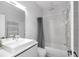 Contemporary bathroom featuring sleek vanity, modern fixtures, and a combined shower and tub at 7130 102Nd Ln, Seminole, FL 33772