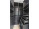 Spacious walk-in closet with gray cabinetry and open shelving at 7130 102Nd Ln, Seminole, FL 33772