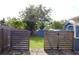 Large backyard with a fenced perimeter, perfect for outdoor activities at 731 20Th Nw St, Largo, FL 33770
