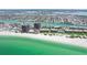 Scenic aerial view of Treasure Island condos, beach, intercoastal waterway and Gulf of Mexico at 7564 Bayshore Dr # 302, Treasure Island, FL 33706