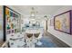 Open dining area with view of the kitchen, great for entertaining guests and Gathering at 7564 Bayshore Dr # 302, Treasure Island, FL 33706