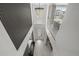 Grand foyer with modern chandelier and accent wall welcomes you with style and sophistication at 7819 Notched Pine Bnd, Wesley Chapel, FL 33545