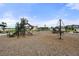 A well-maintained playground with slides and climbing structures in the community at 7819 Notched Pine Bnd, Wesley Chapel, FL 33545