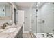 Beautiful bathroom with a glass shower, tiled walls, and modern fixtures at 8006 Tanglewood Ln, Tampa, FL 33615