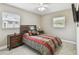Cozy bedroom with a ceiling fan, bright windows, and a comfortable bed, creating a serene retreat at 8006 Tanglewood Ln, Tampa, FL 33615