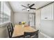 Dining room featuring a wood table with seating and natural light at 8006 Tanglewood Ln, Tampa, FL 33615