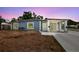 Charming single-story home with a unique gated entrance and cozy front yard at 8006 Tanglewood Ln, Tampa, FL 33615
