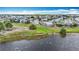 Community homes with lake view in a peaceful, residential neighborhood at 904 Desert Hills Dr, Sun City Center, FL 33573