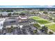 Aerial view of community amenities with a fitness center and activities at 904 Desert Hills Dr, Sun City Center, FL 33573