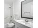 Bright bathroom with walk-in shower and classic vanity is ready for your personal touches at 904 Desert Hills Dr, Sun City Center, FL 33573