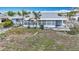 Charming single-story home with a screened-in porch and mature landscaping at 904 Desert Hills Dr, Sun City Center, FL 33573