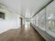 The Florida room features tiled floors and many windows providing ample sunlight at 904 Desert Hills Dr, Sun City Center, FL 33573
