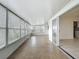Enclosed Florida room with tile flooring and lots of windows for bright, natural light at 904 Desert Hills Dr, Sun City Center, FL 33573