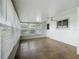 Sunlit Florida room with tile flooring and many windows offering natural light at 904 Desert Hills Dr, Sun City Center, FL 33573