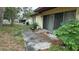 The backyard has a patio, sliding glass door and a grill perfect for entertaining at 531 Carriage Hills Dr, Temple Terrace, FL 33617