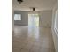 Spacious living room with large sliding glass doors at 10807 Candle Stick Ln, Riverview, FL 33579