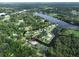 Aerial view highlighting the property's location on the canal with easy access to the main lake at 10922 Park Dr, Riverview, FL 33569